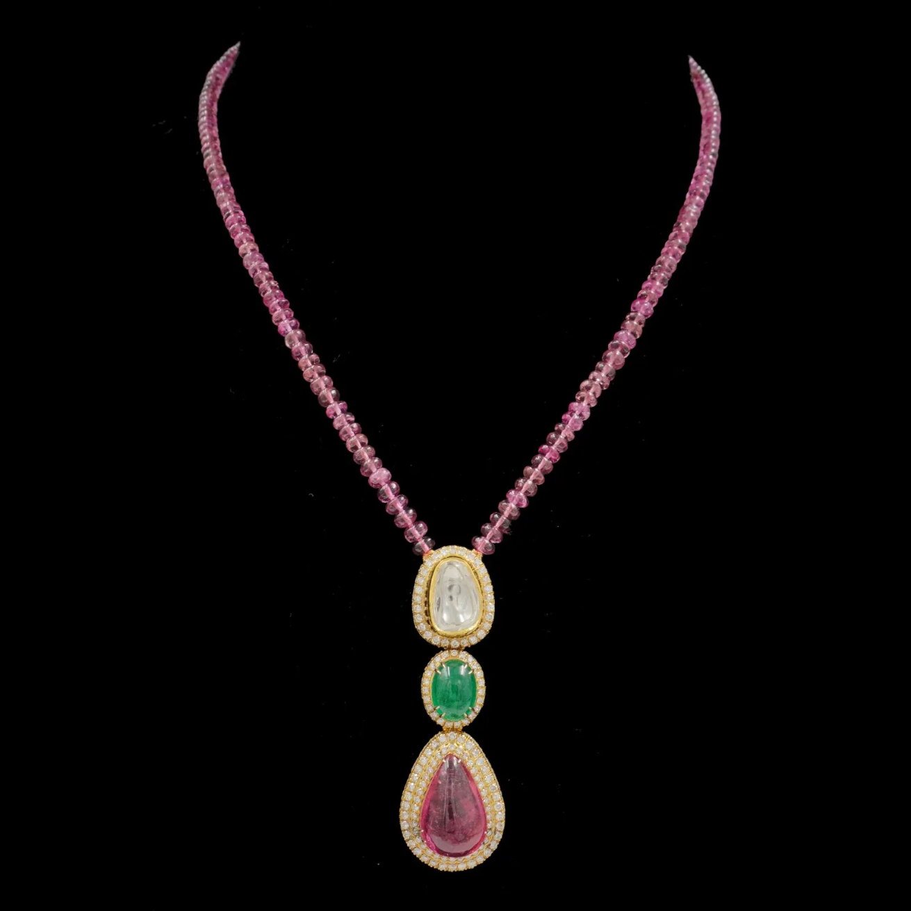 14 k Pink gold tourmaline emerald